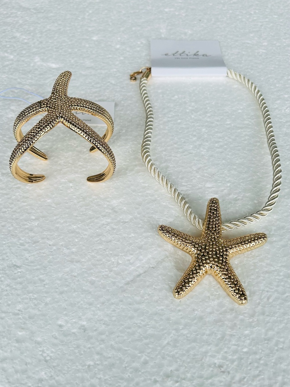 Ettika
Starfish Cord Pendant Necklace & starfish cuff bracelet set